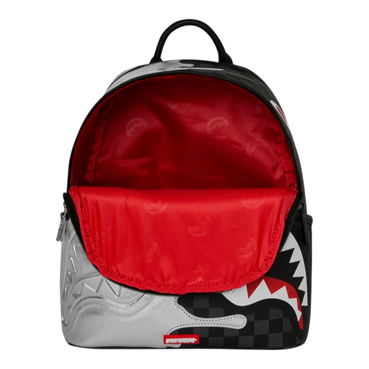 HypeSelection Silver Side Drip Savage backpack with shark face design, black checkered pattern, and red interior.