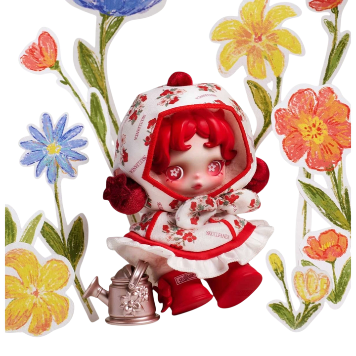 HypeSelection SKULLPANDA Amid Flowers plush doll pendant with red hair, floral print outfit, and red boots. Features vinyl face and metal attachment.