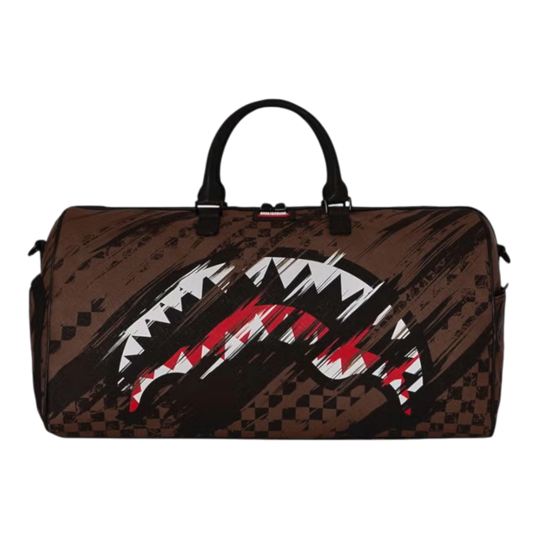 HypeSelection SMEARED GRUNGE DUFFLE: Brown PVC duffle bag with distressed paint-smear pattern and iconic shark graphic. Multiple pockets and carry options.