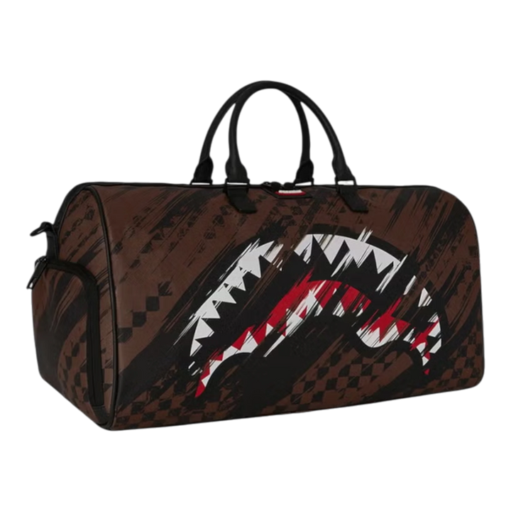 HypeSelection SMEARED GRUNGE DUFFLE bag with brown distressed paint-smear pattern and shark graphic. PVC material.