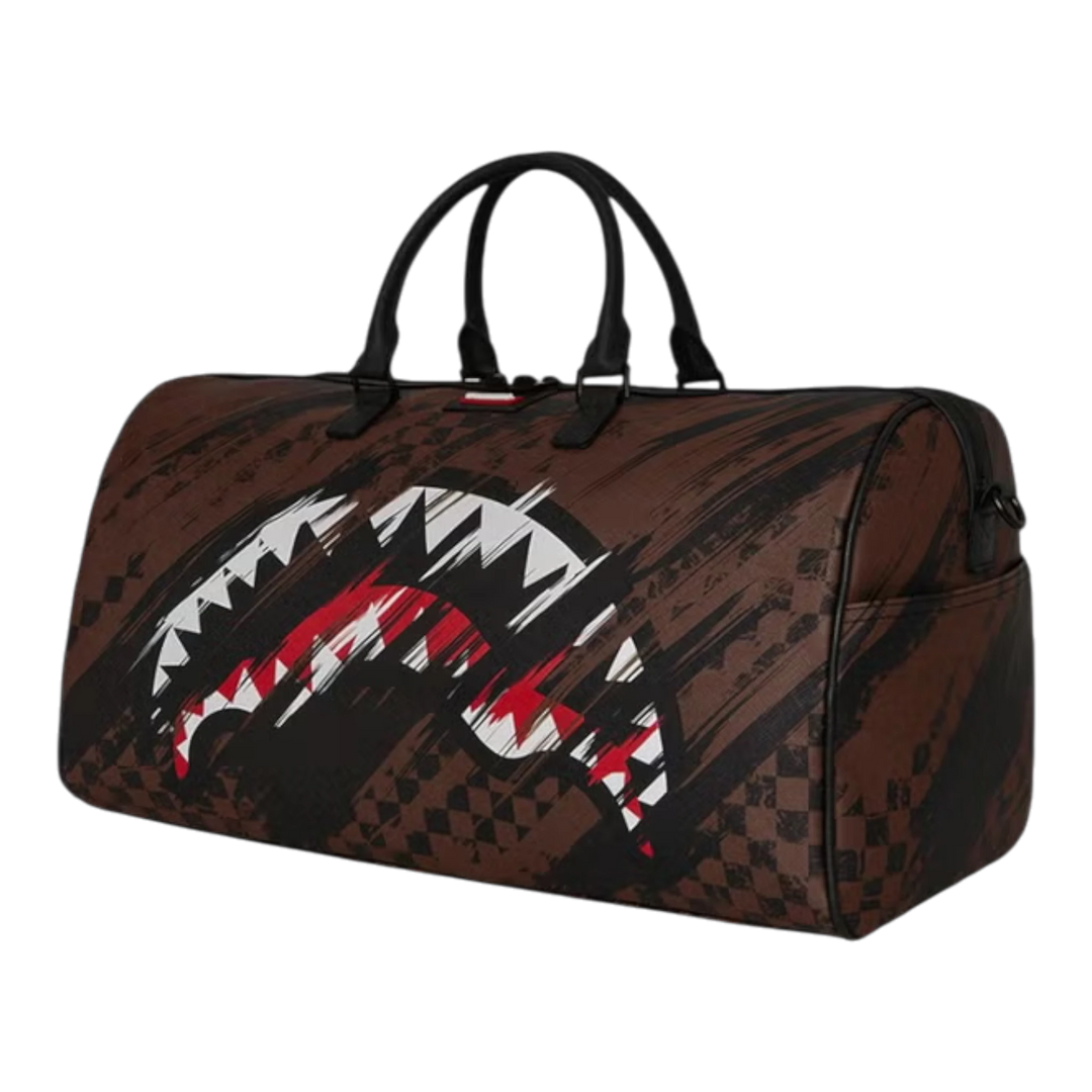 HypeSelection SMEARED GRUNGE DUFFLE: Brown PVC duffle bag with distressed paint-smear pattern and shark graphic.