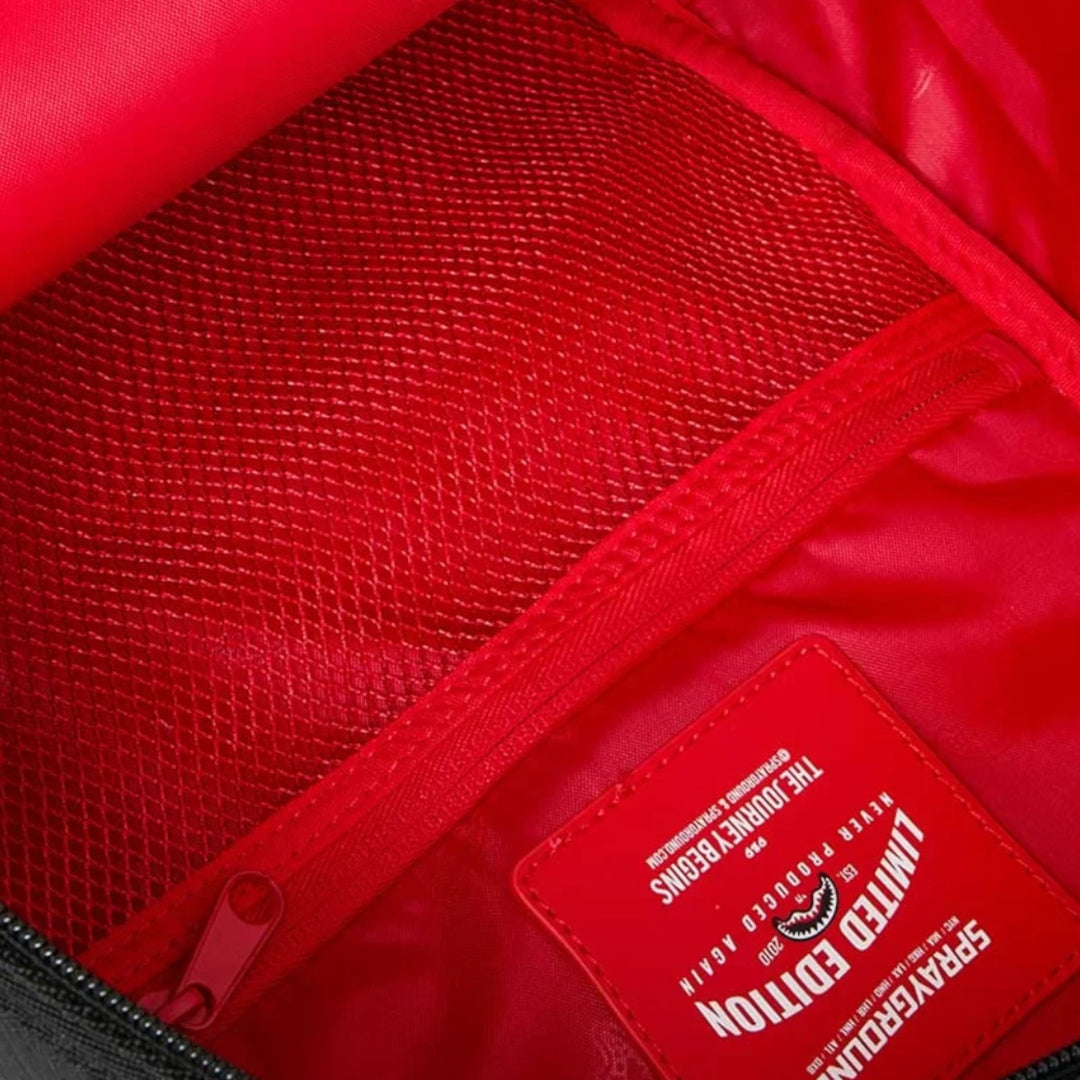 HypeSelection Sprayground Lux Black Ghost Drip Mini DLX backpack interior with red mesh pocket and brand label