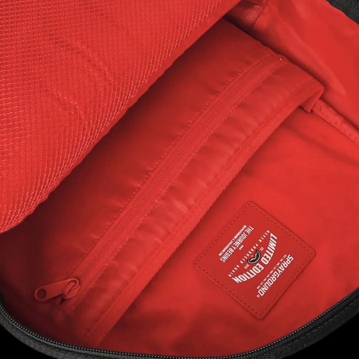 HypeSelection Sprayground backpack interior featuring bright red lining, mesh pocket, and limited edition label