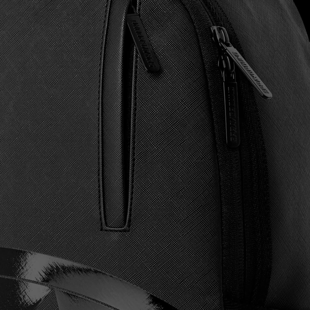 HypeSelection Sprayground Lux Black Ghost Drip backpack featuring textured black material and branded zipper pulls
