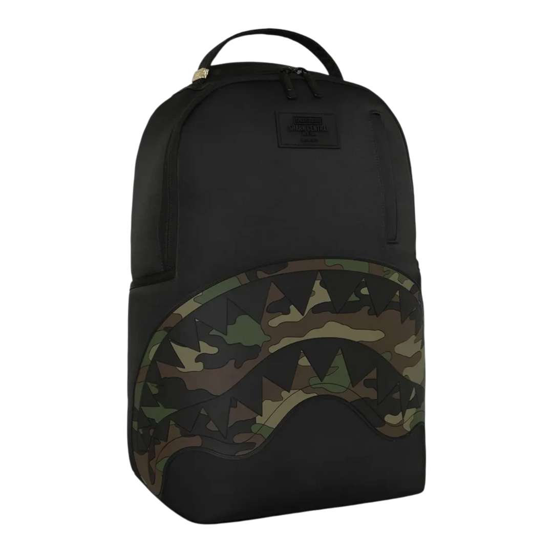 HypeSelection Sprayground black nylon backpack featuring an embossed camo shark mouth design for streetwear style.