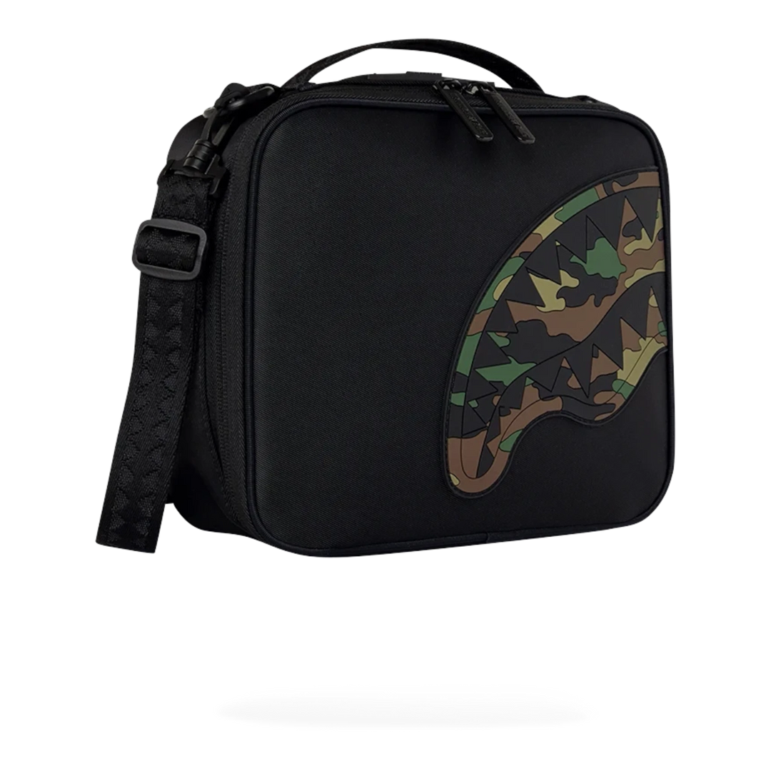 HypeSelection Sprayground black nylon snackpack with embossed camo shark mouth graphic and adjustable shoulder strap.
