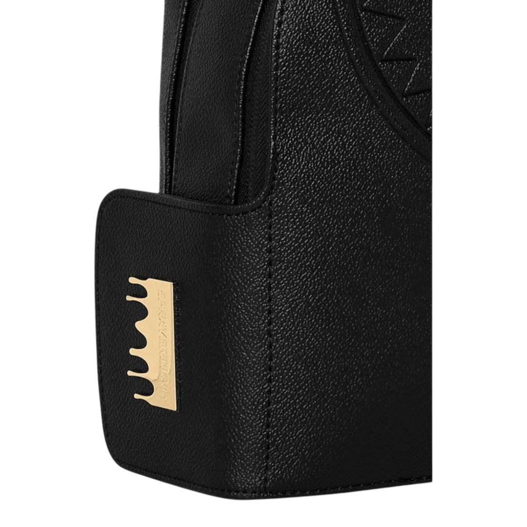 HypeSelection Sprayground black synthetic leather backpack sling with gold-tone logo plaque and embossed shark motif