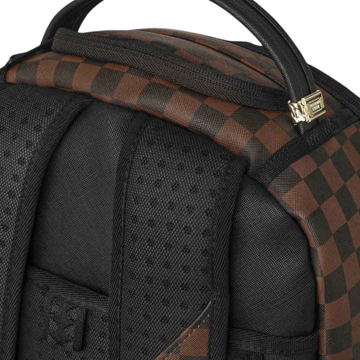 HypeSelection Sprayground brown check Ghost Drip backpack featuring black padded straps and a top carry handle