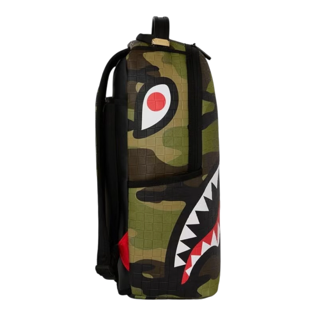 HypeSelection Sprayground Woodland Camo Check backpack with iconic shark mouth graphic in side profile view.