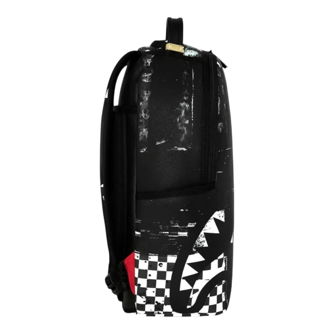 HypeSelection Sprayground Painted Over Check DLXSV backpack with black and white graphic shark mouth and checkerboard