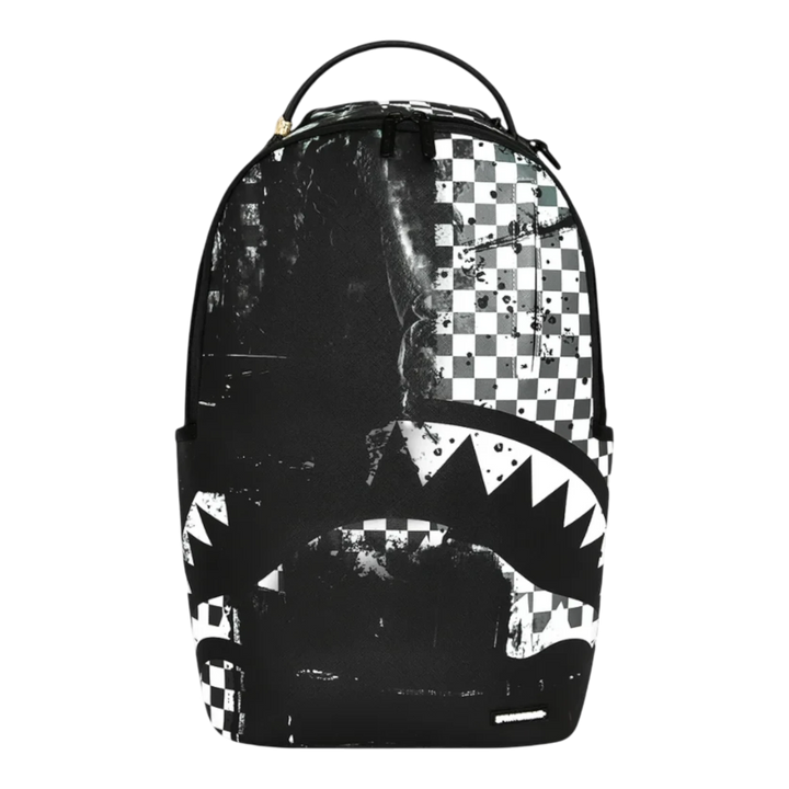 HypeSelection Sprayground Painted Over Check DLXSV backpack featuring a black and white graphic shark mouth design.