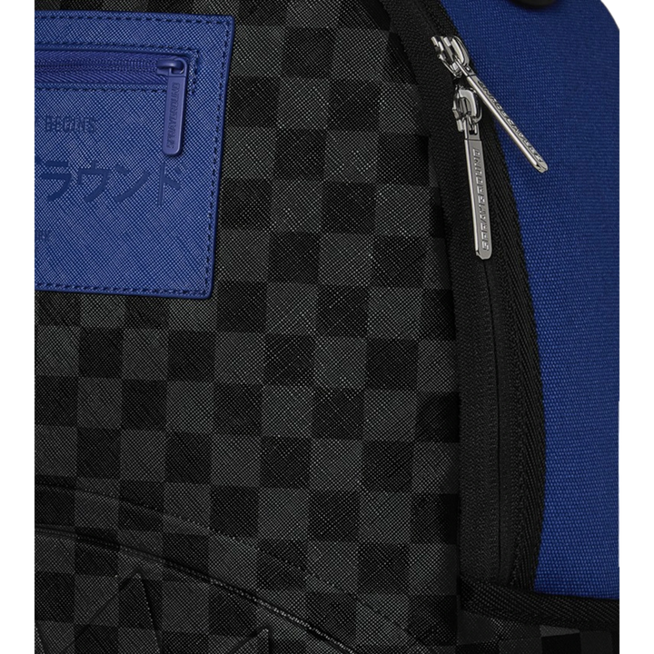 HypeSelection Sprayground BENCH CLEARING backpack with black and grey checkerboard pattern and blue accents.