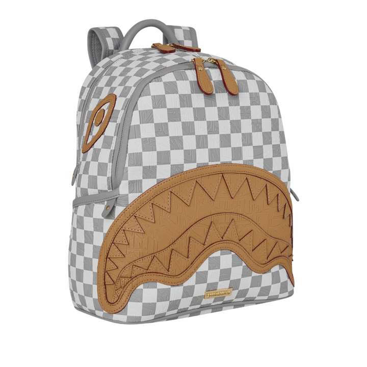 HypeSelection Sprayground Ritz Riviera Savage backpack featuring a grey and white checkerboard pattern with tan shark mouth
