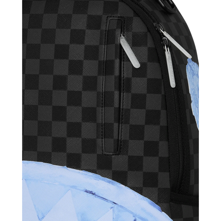 HypeSelection Sprayground Sharks On Iceberg DLXSV backpack featuring a black and grey checkered pattern and zipper