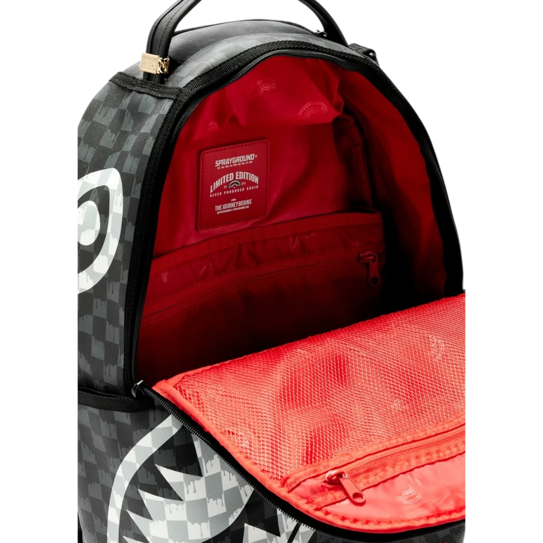 HypeSelection Sprayground black and white checkered backpack with open red interior and limited edition patch