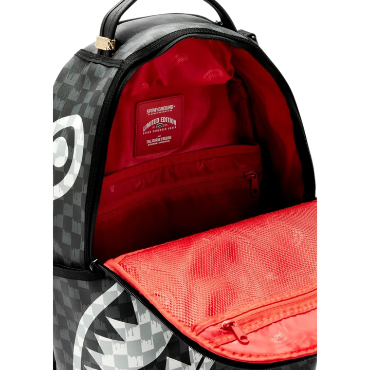 HypeSelection Sprayground black and white checkered backpack with open red interior and limited edition patch