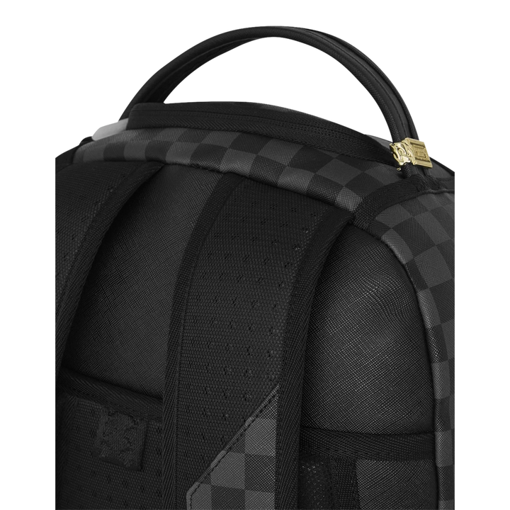 HypeSelection Sprayground Sharks On Iceberg DLXSV backpack featuring a black and grey checkered pattern top handle.