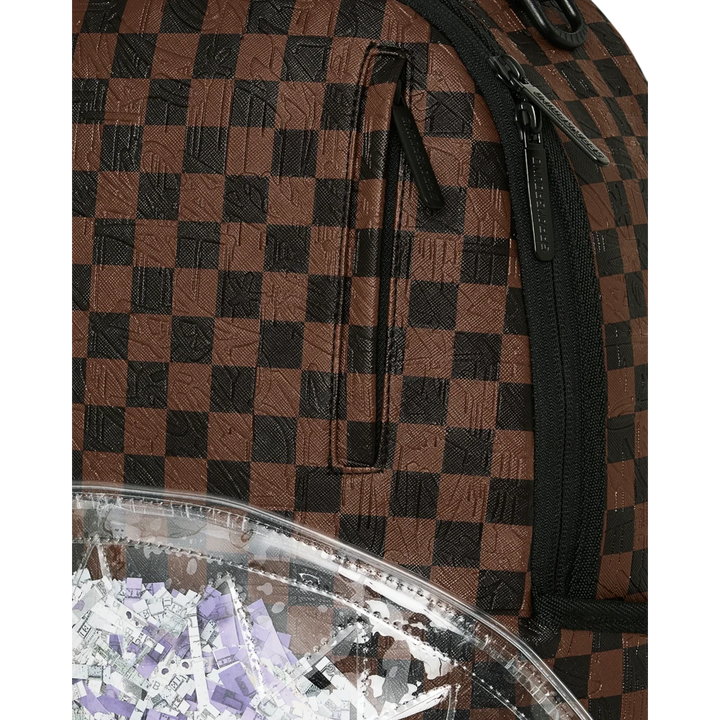 HypeSelection Sprayground Shredded Money DLXSV backpack featuring a brown and black checkered pattern and clear pocket.
