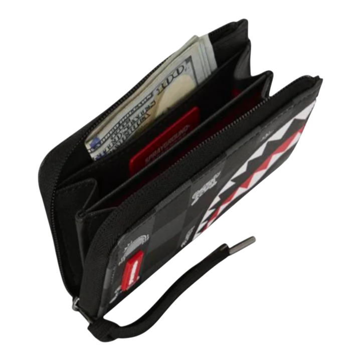 HypeSelection Sprayground black checkered wallet with shark teeth graphic and red accents. Features card slots, bill compartment, and ID window.