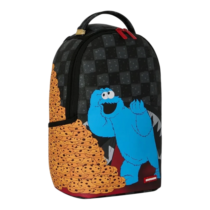 HypeSelection Sprayground Sesame Street Cookie Monster mini backpack with a black checkerboard pattern and cookie pile