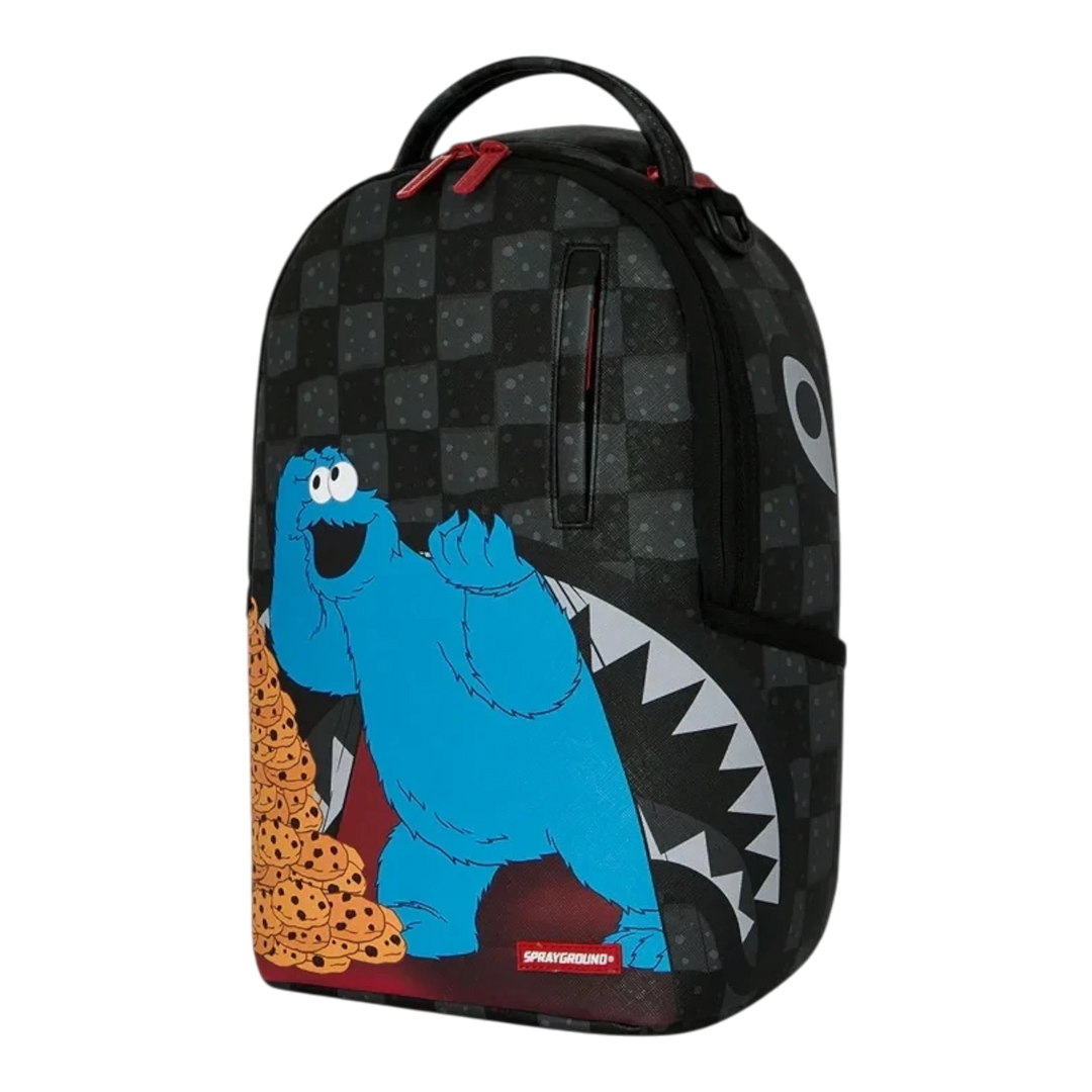 HypeSelection Sprayground Sesame Street Cookie Monster mini backpack with black checkerboard and shark mouth design