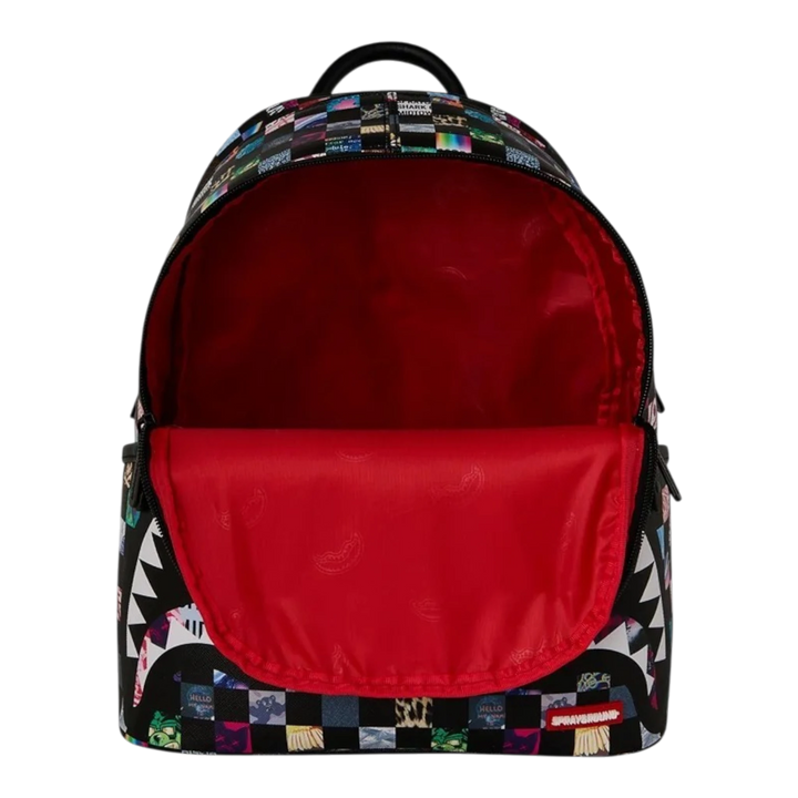 HypeSelection Sprayground Crazy Check Savage backpack with open main compartment and vibrant red interior lining.