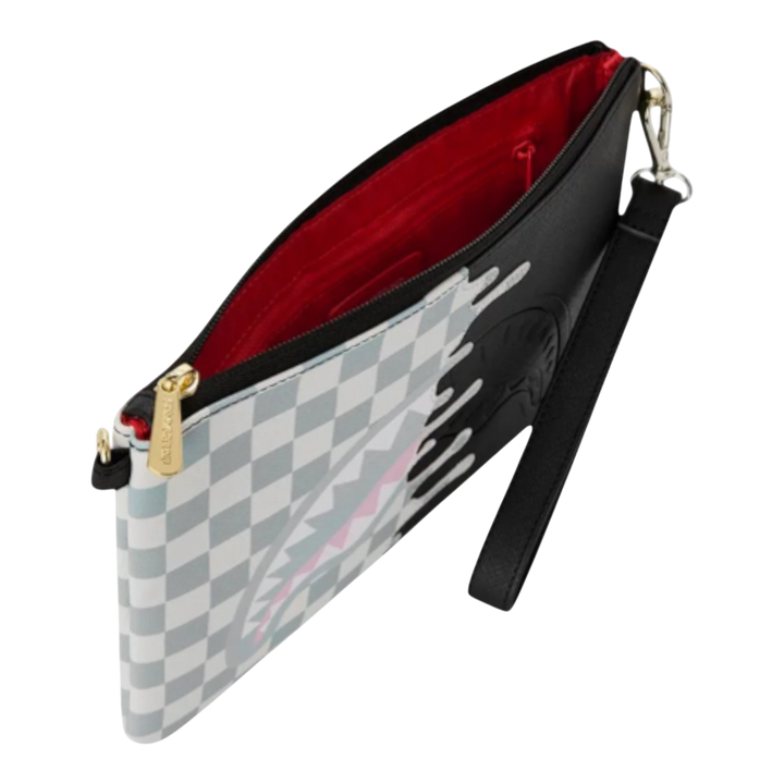 HypeSelection Sprayground cream check crossover clutch with black drip detail and red interior. Features a shark mouth graphic.