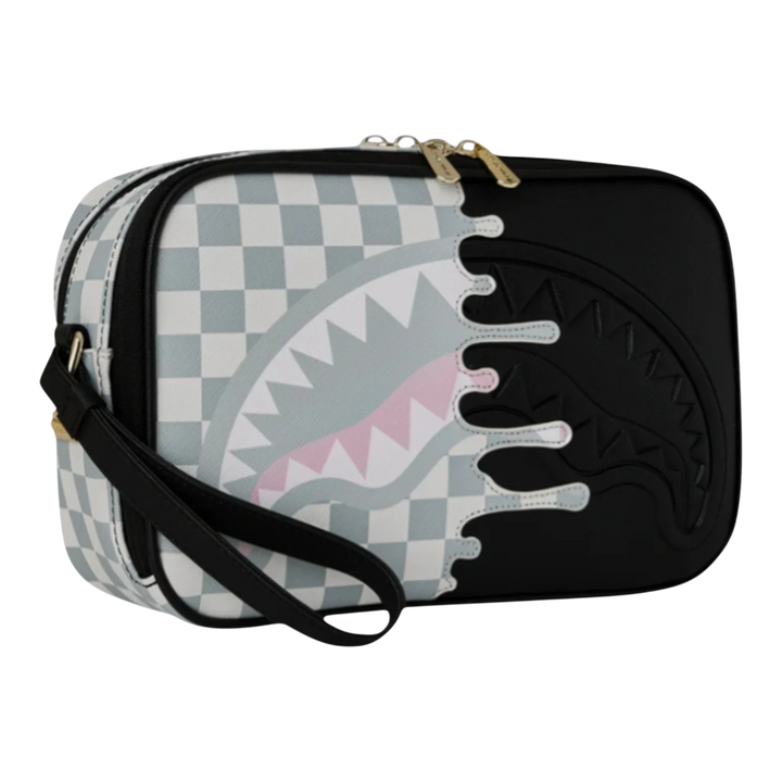 HypeSelection Sprayground cream check toiletry brick bag with black drip graphic and shark teeth detail.
