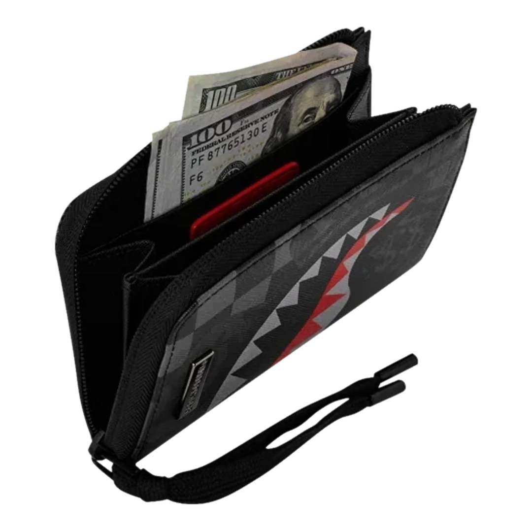 HypeSelection Sprayground 4AM Eclipse wallet featuring iconic shark mouth graphic, zipper closure, and cash storage.