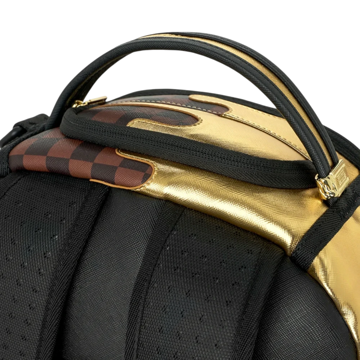HypeSelection Sprayground Sharks In Paris backpack featuring metallic gold drip and brown checkerboard details.