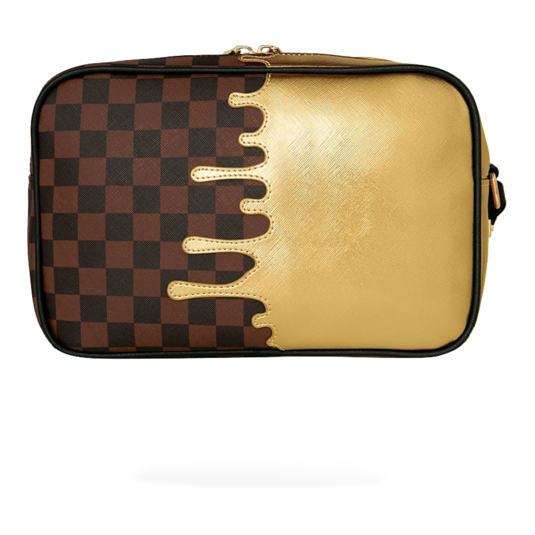HypeSelection Sprayground toiletry bag featuring a brown checkered pattern with a metallic gold drip design.