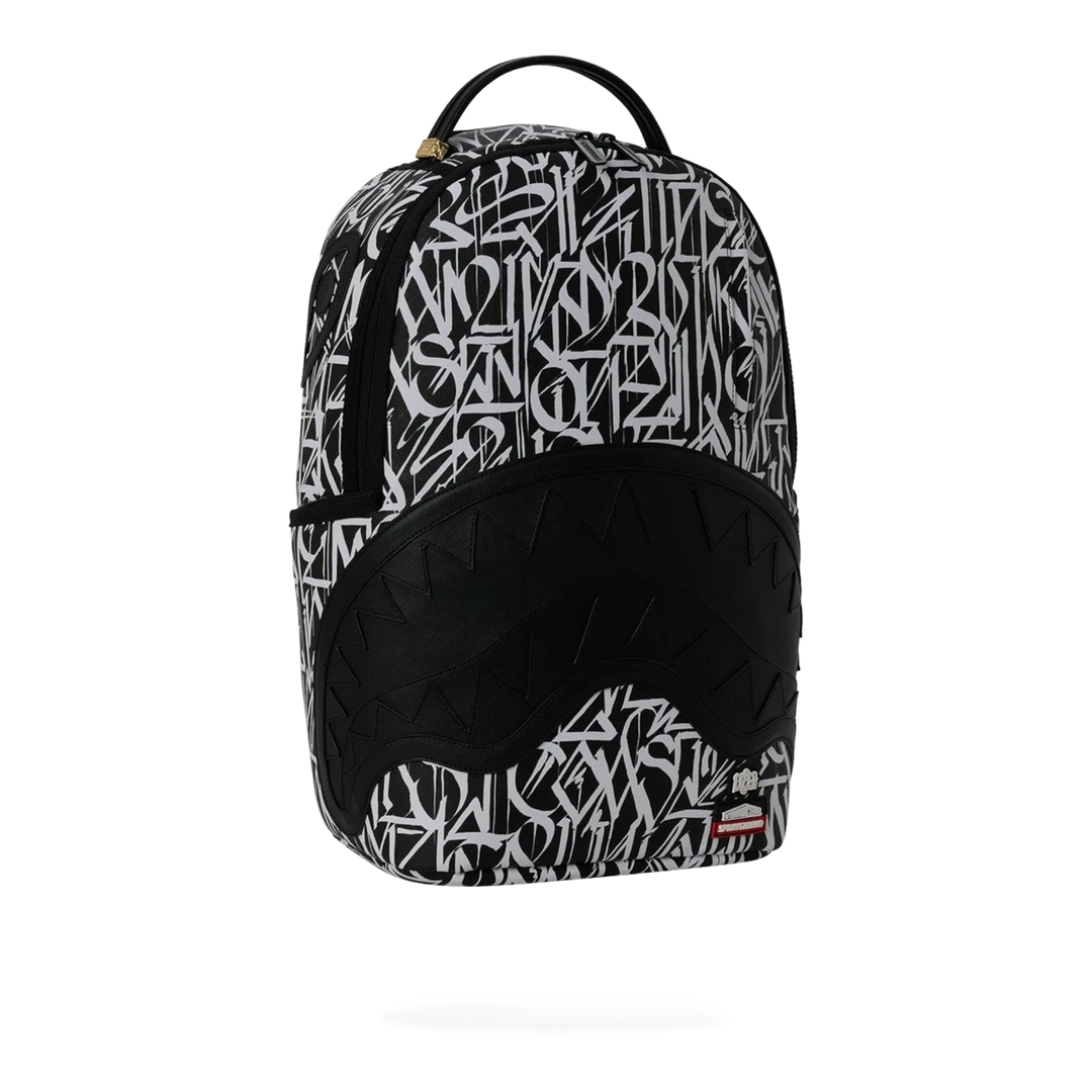 HypeSelection Sprayground Wynwood Walls Defer DLXSV backpack in black and white graffiti print faux leather