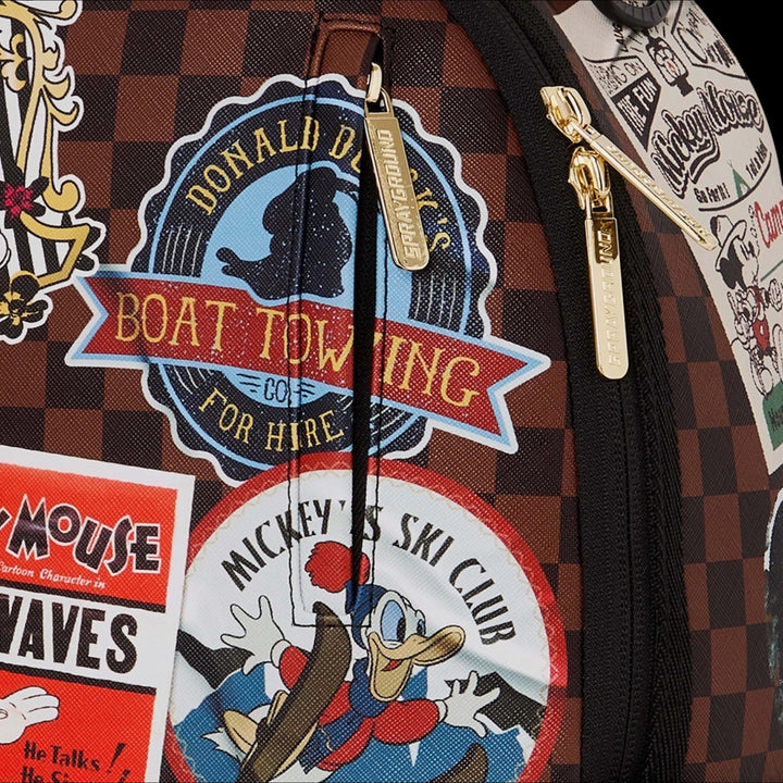 HypeSelection Sprayground Mickey Global Mogul backpack featuring brown checkered pattern and vintage Disney patches