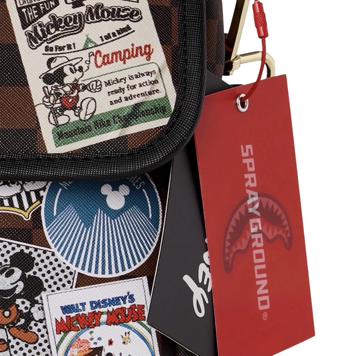 HypeSelection Sprayground Mickey Mouse messenger sling bag with graphic patches and red brand tag