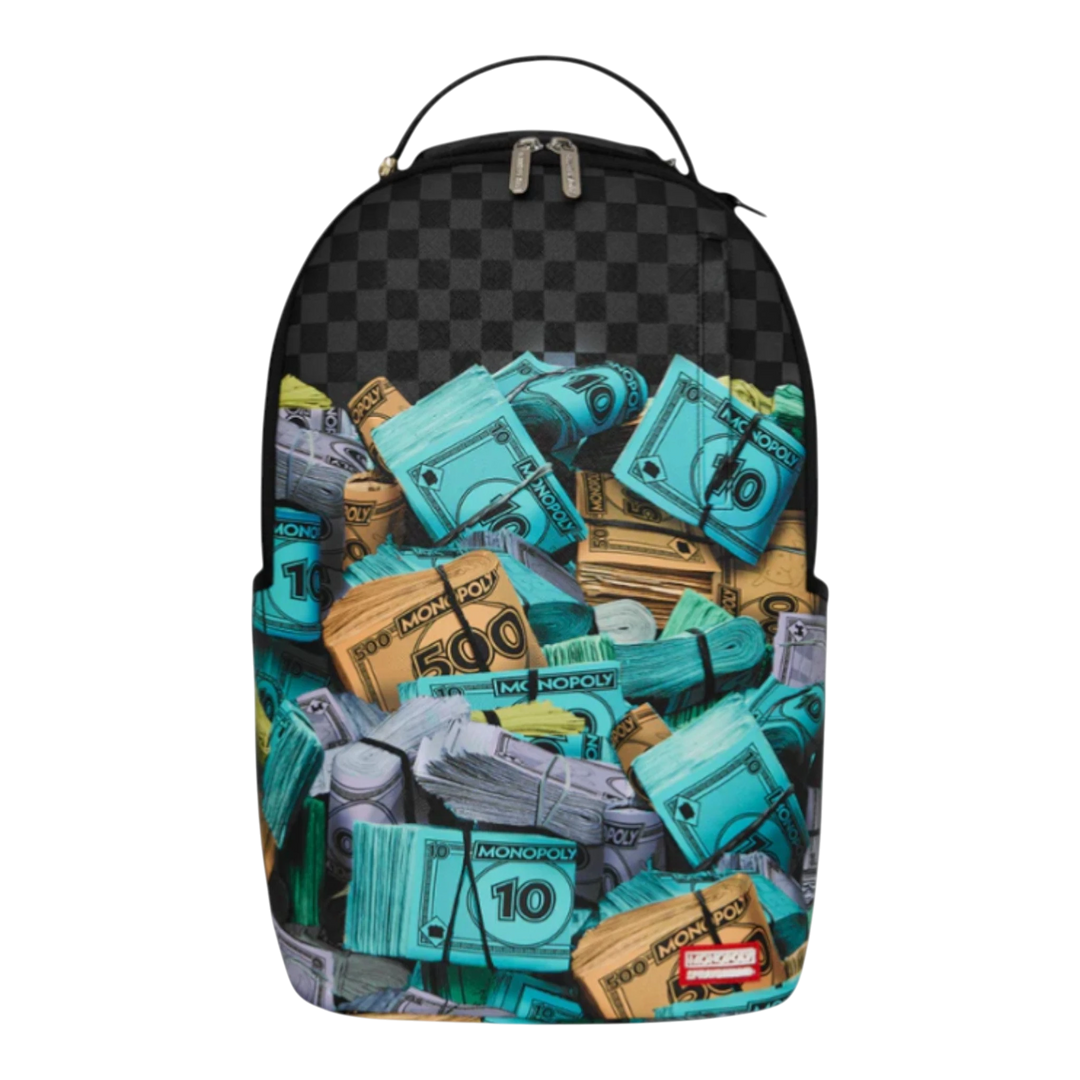 HypeSelection Sprayground Monopoly Money Stacks backpack with a checkered top and a graphic print of stacked Monopoly money bills in blue, yellow, and green.