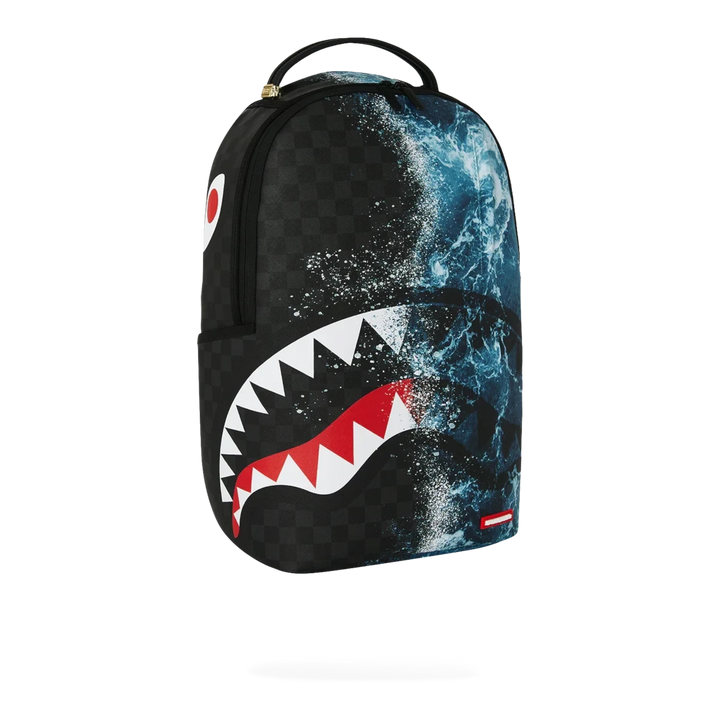 HypeSelection Sprayground Split Ocean Deep DLXSV backpack featuring a black checkerboard and ocean wave shark graphic.