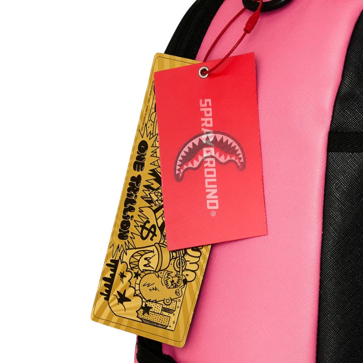 HypeSelection Sprayground Shark Central pink backpack with branded red and gold hang tags attached