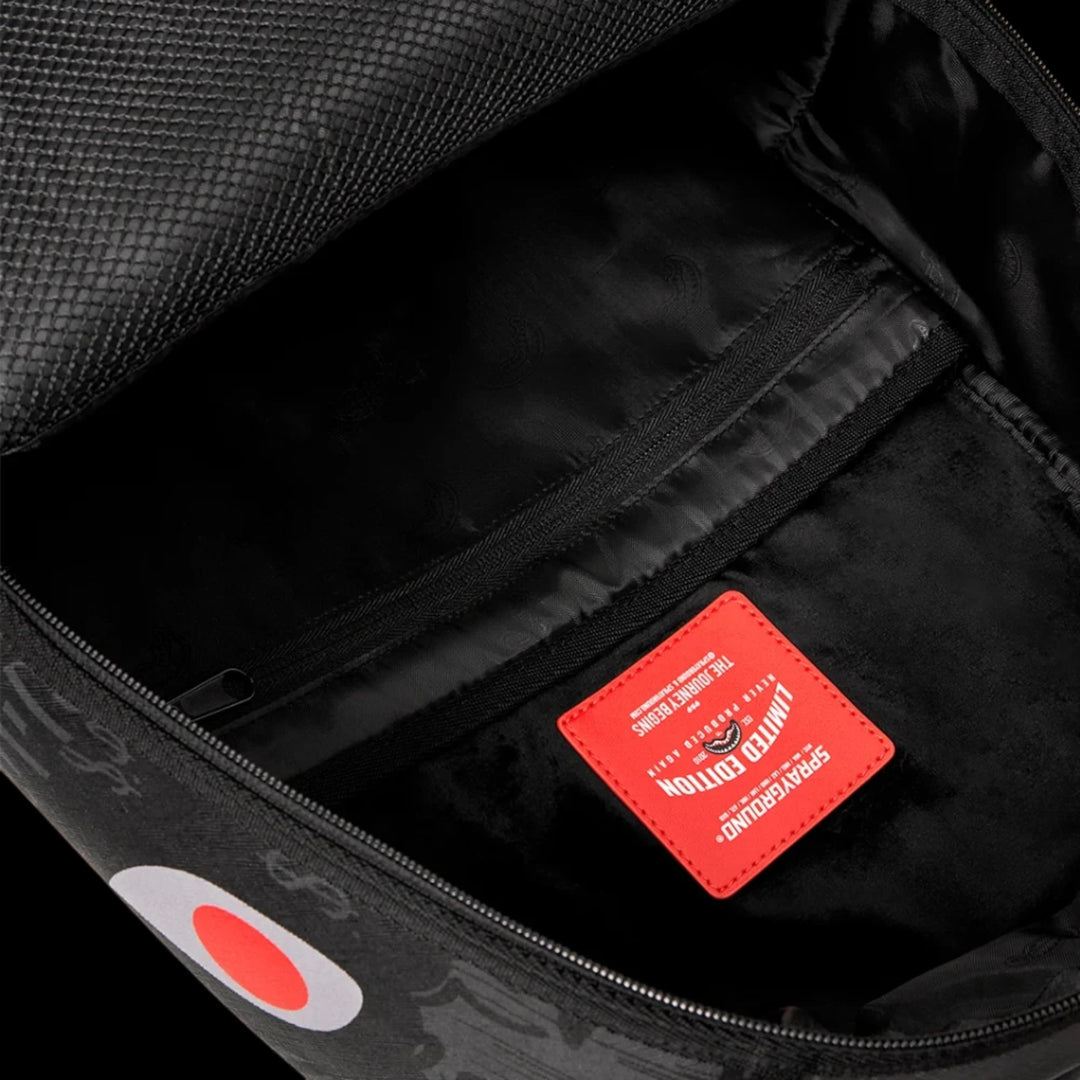 Interior of HypeSelection Sprayground 4AM Red Shark backpack featuring a red limited edition label and black lining