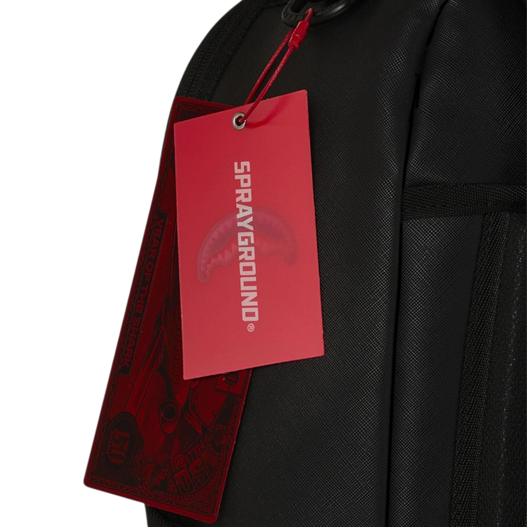 HypeSelection Sprayground black synthetic backpack with iconic shark mouth design and red tags.