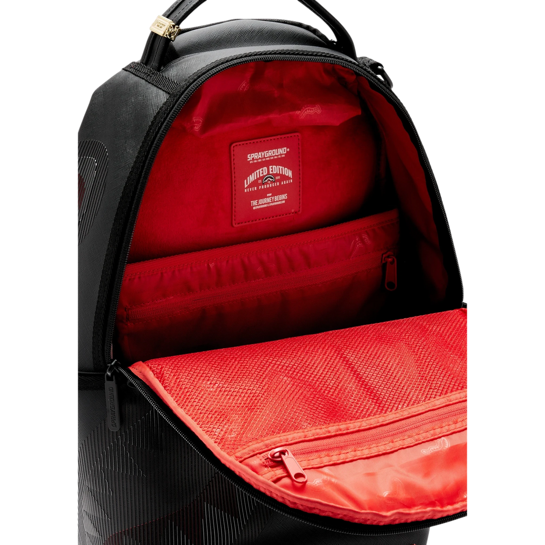 HypeSelection Sprayground Disappearing Shark DLXSV backpack with black exterior and vibrant red interior lining