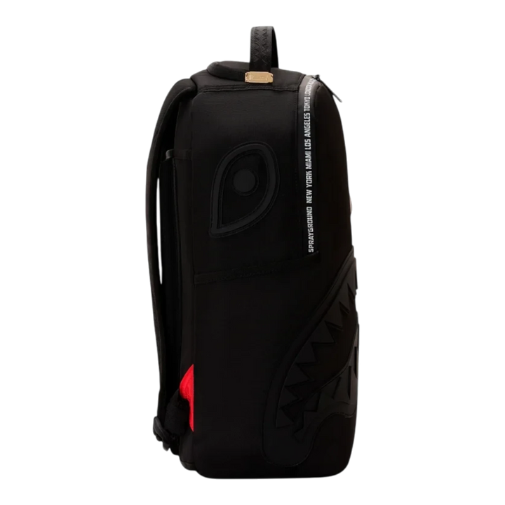 HypeSelection Sprayground Shark Central DLX backpack in black with signature shark mouth graphic and side view.