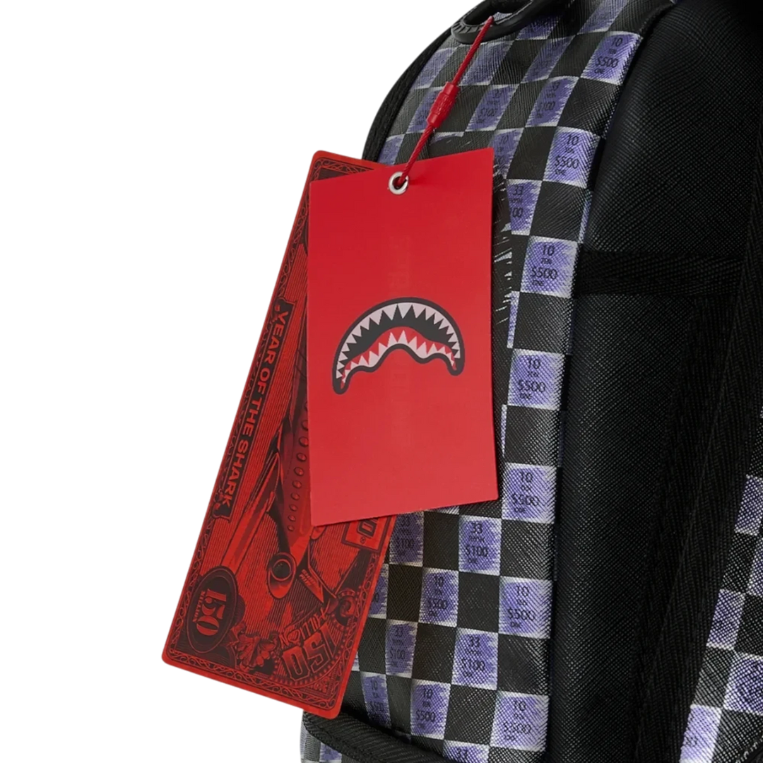 HypeSelection Sprayground Scratch Off Shark backpack with red branded hang tags and checkered graphic pattern