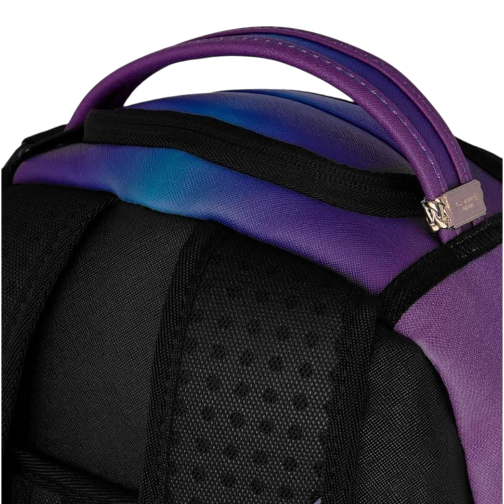 HypeSelection Sprayground Shark Central backpack featuring purple and blue gradient nylon with a padded top handle