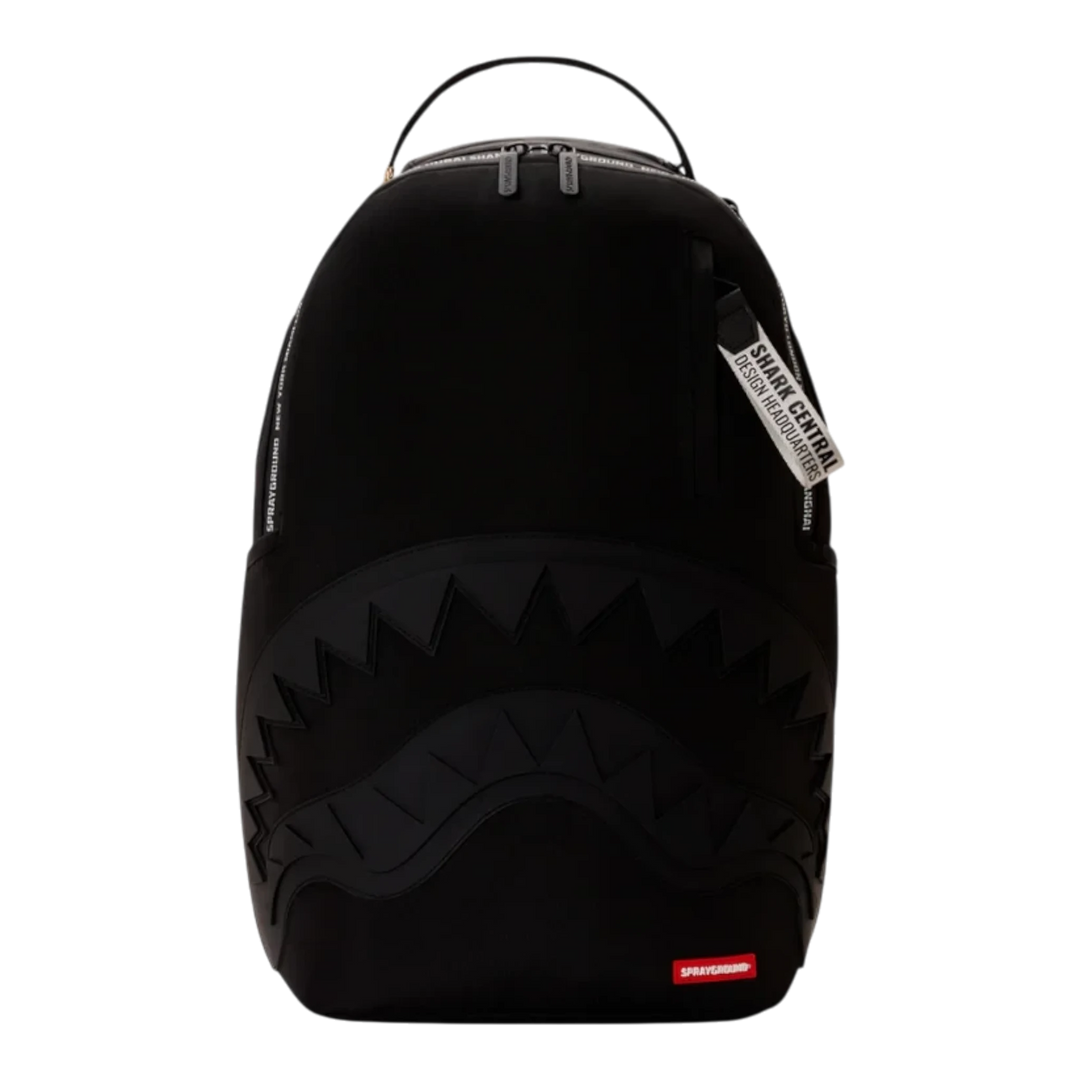 HypeSelection Sprayground Shark Central black backpack with signature shark mouth graphic and zip compartments.