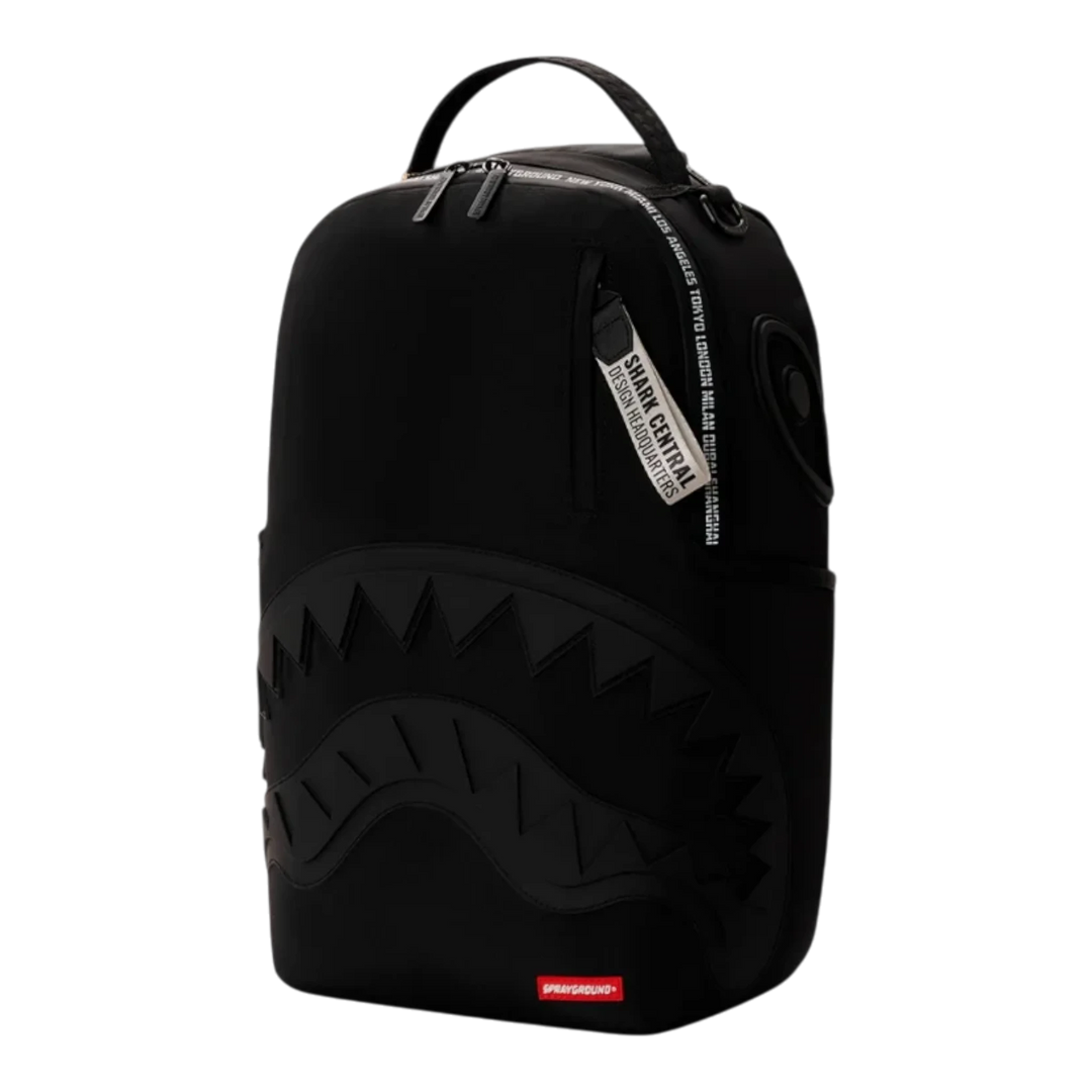 HypeSelection Sprayground Shark Central black backpack with signature shark mouth graphic and zip pocket detail