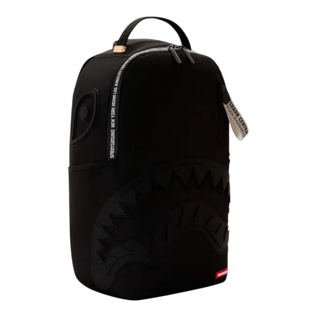 HypeSelection Sprayground Shark Central black backpack with signature shark mouth graphic and zip detailing.