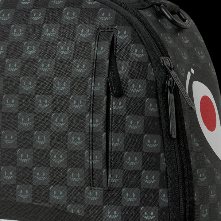 HypeSelection Sprayground Sharks In Paris backpack featuring a black checkered pattern with bubbly shark mouth icons.