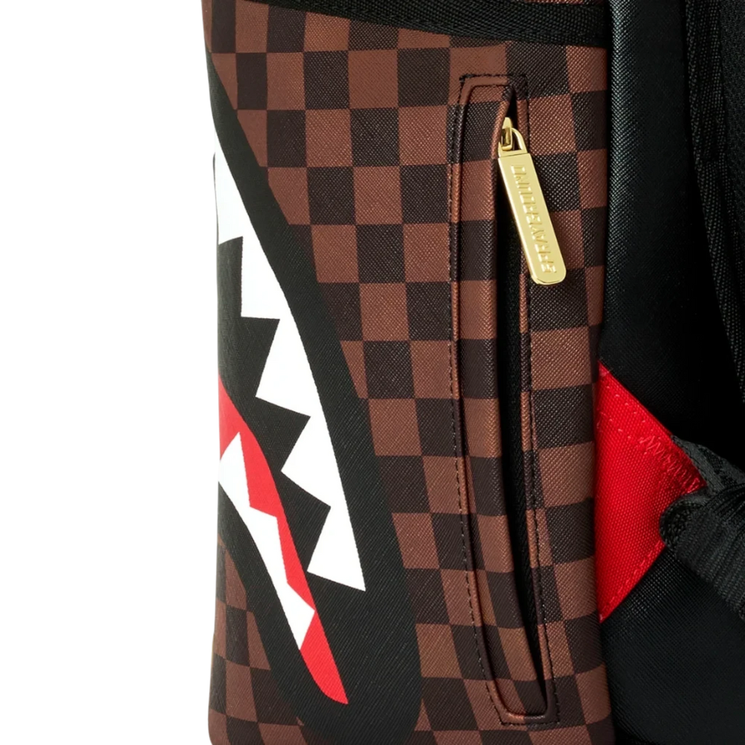 HypeSelection Sprayground Sharks In Paris backpack featuring brown checkerboard pattern and iconic shark mouth graphic