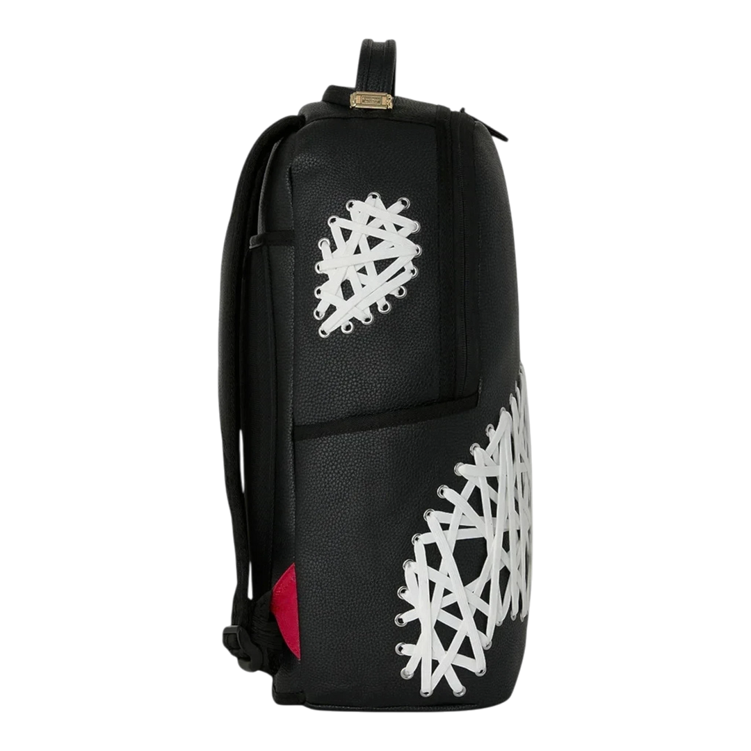 HypeSelection Sprayground Shoelace Shark DLXSV black backpack with white crisscross lace detailing on side profile