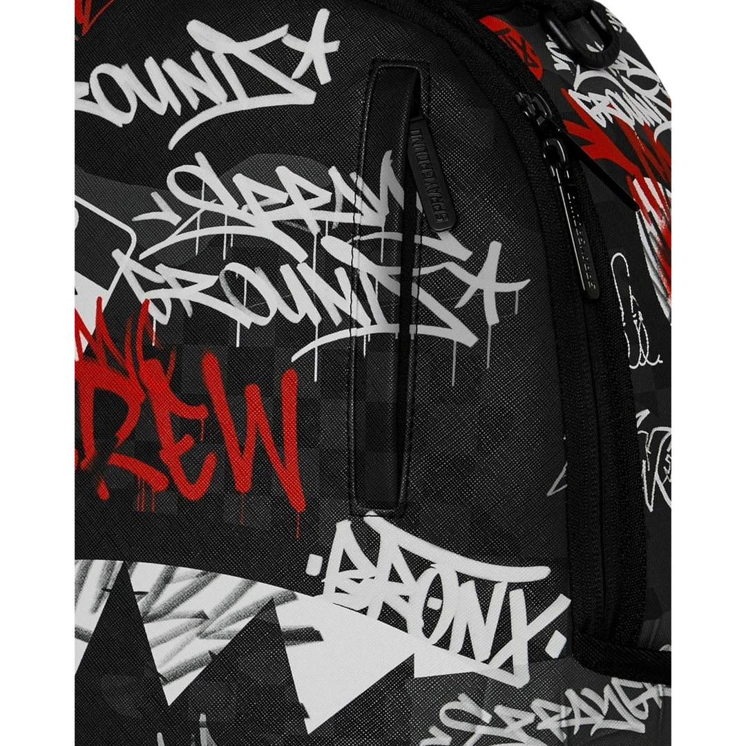 HypeSelection Sprayground Tagged Up DLXSV backpack featuring black fabric with white and red graffiti print